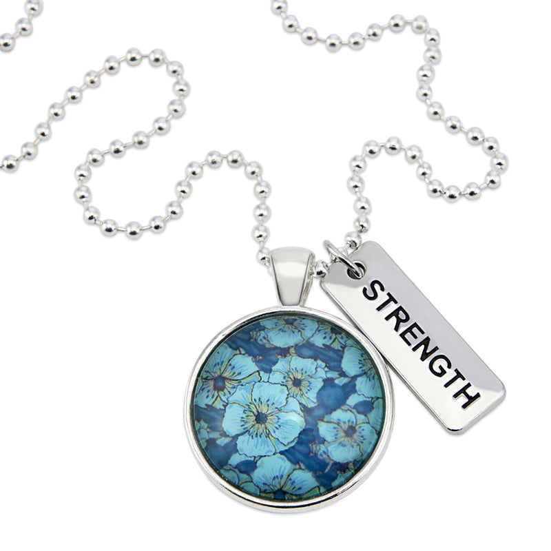 Teal floral print pendant necklace in bright silver with strength charm. 