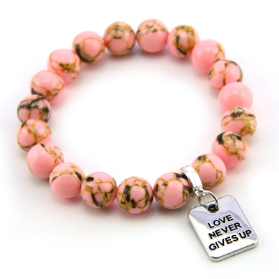 Soft Pink Synthesis Stone 10mm Bead Bracelet with Love Never Gives Up Silver Word Charm. Fundraiser for the National Breast Cancer Foundation