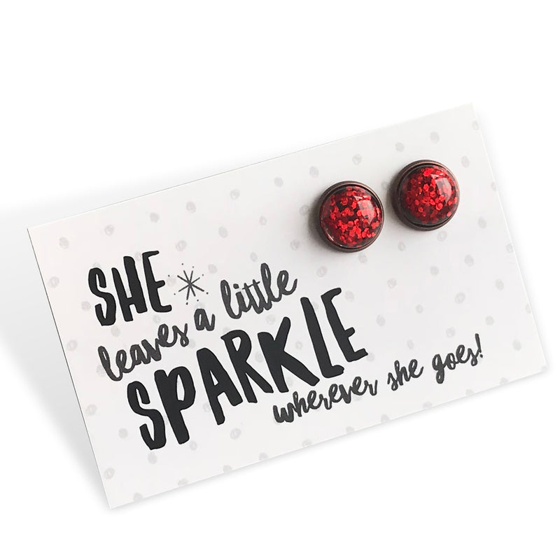 She leaves a little sparkle wherever she goes earring gift card with 12mm ruby red glitter earring studs with vintage copper circle surround.  