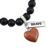 Matt black onyx stone bead bracelet with copper sparkle sandstone heart charm and inspiring word charms in silver.