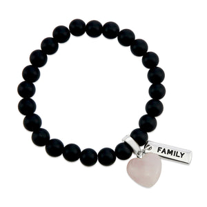 Matt black onyx stone bead bracelet with rose quart6z stone heart pendnat charm and silver inspiring word charms. 