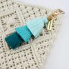 Tassel Keyring / Bag Accessory in shades of teal with gold Friendship word charm