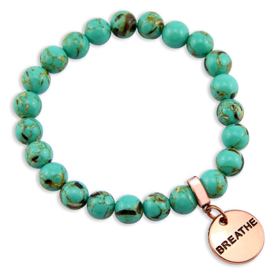 Light teal stone bead bracelet with rose gold meaningful word charm.
