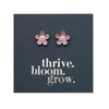 pink bloom sterling silver stud with pink enamel detail on a foil thrive bloom grow card