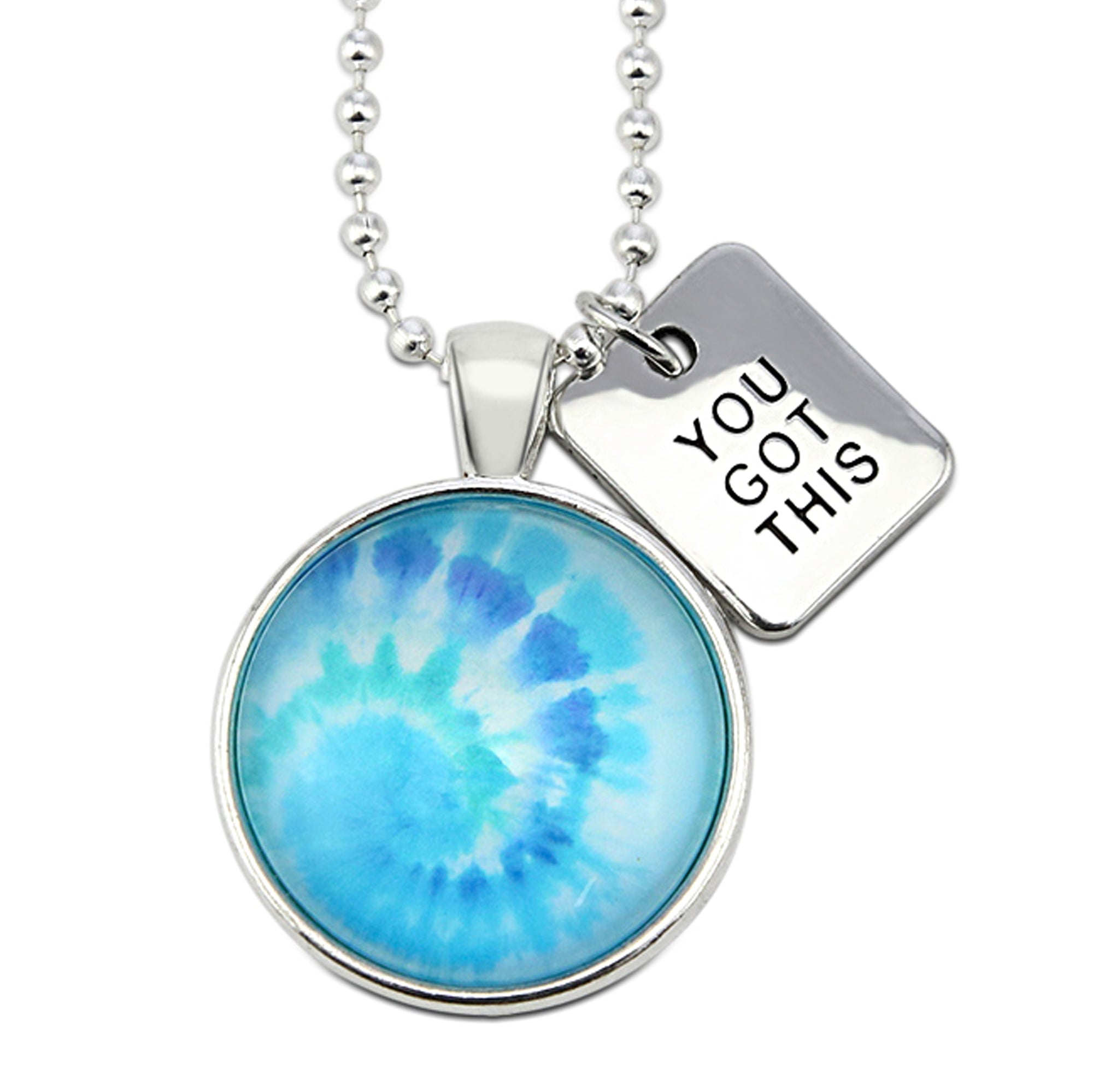 Teal tie dye print pendant necklace in bright silver with you got this charm. 