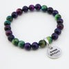 Purple aqua and mint tonesd tigers eye stone beaded bracelet with silver inspiring word charm.