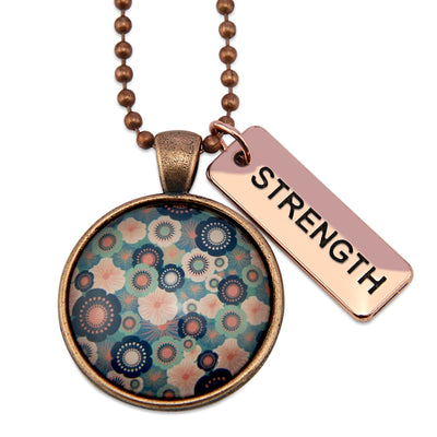 Teal floral print rose gold pendant necklace with strength charm.
