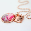 Pink leaf print with rose gold pendant necklace setting and never give up charm.