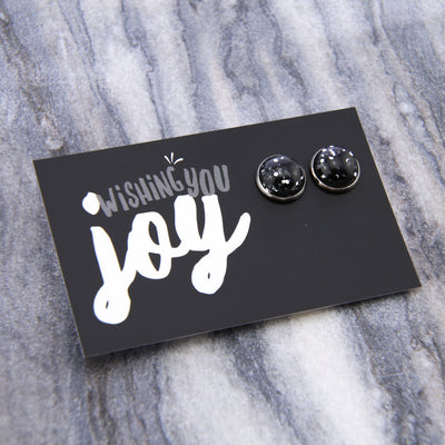 Black and silver glitter stud earrings with silver surround on wishing you joy card.