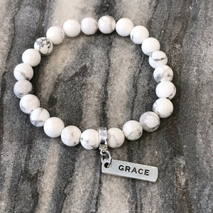 8mm White Marble Stone Bracelet with word charm and silver clip. Featured words are Soul Sister, Family, Grateful, Strength, Hope, Grace, Friendship, Loved, Courage, Brave, Embrace, Enough and many more. 