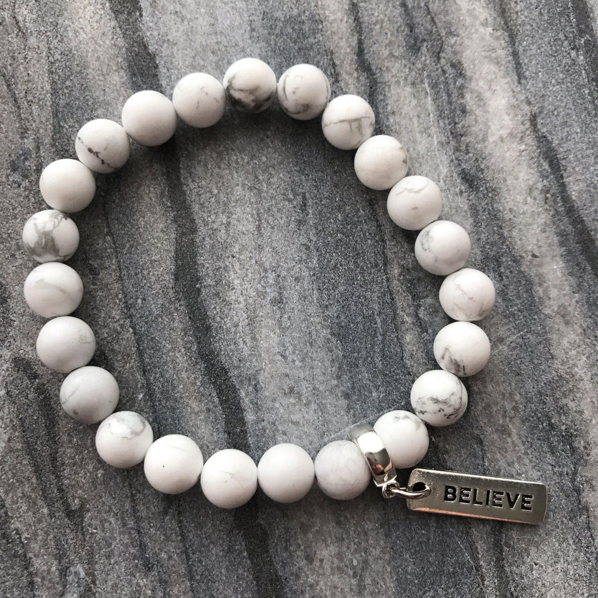 8mm White Marble Stone Bracelet with word charm and silver clip. Featured words are Soul Sister, Family, Grateful, Strength, Hope, Grace, Friendship, Loved, Courage, Brave, Embrace, Enough and many more. 
